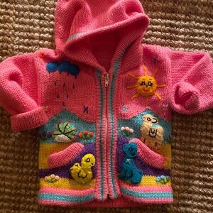 Pink folk baby sweater